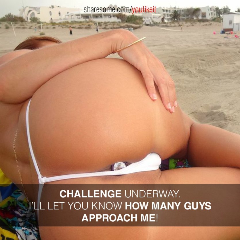 На пляже в стрингах с анальной пробкой