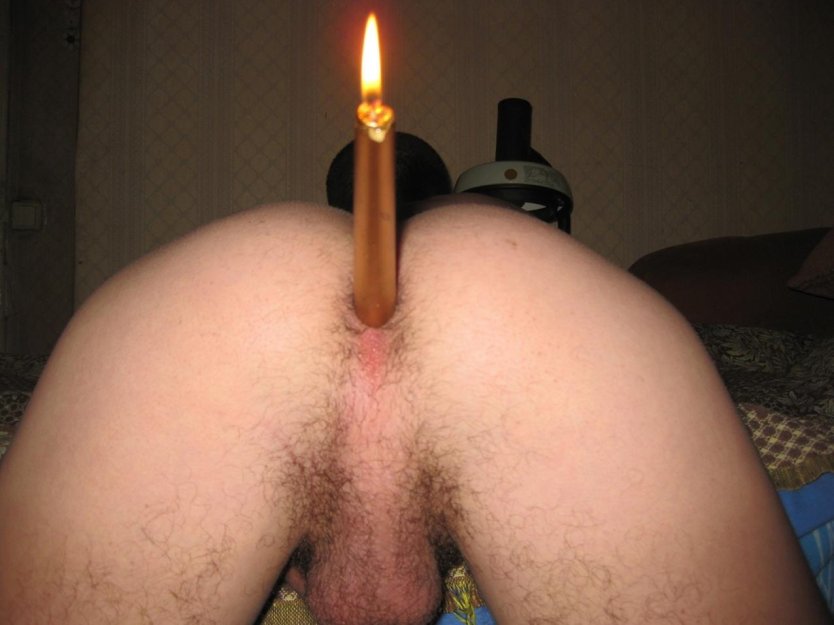 Горящие свечи в заднице